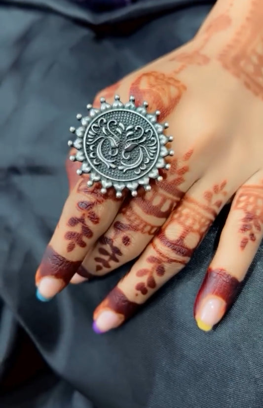 Carved silver ring